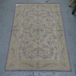 A Laura Ashley Home cotton and wool mauve and purple ground rug