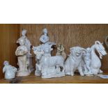 A white porcelain street vendor figure, 16.5cm, a pig, 2 pairs of cows etc