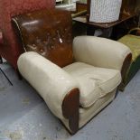 An early 20th century leather and upholstered Club armchair