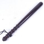 An Antique turned ebony truncheon, 40cm