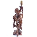 A large modern Chinese carved hardwood figural lamp, height excluding fitting 48cm