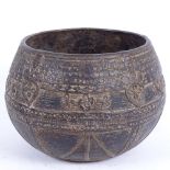 A Middle Eastern? bronze bowl, allover Arabesque decoration, diameter 16cm