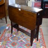 An Edwardian mahogany Sutherland table, W60cm, H61cm