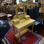 An Antique pine dressing table, with swing mirror and fitted drawers, on turned legs, W91cm, H142cm,