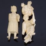 An early 20th century Japanese carved ivory okimono, depicting man with dragon, and another ivory