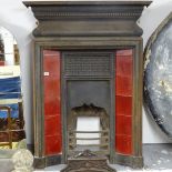 A Victorian cast-iron nursery fire surround, with inset red glazed tiles, W90cm, H122cm