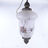 A glass ceiling light, with embossed brass mounts and gilded decoration, height 57cm