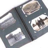 An album of Vintage postcards, including military interest