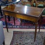 An Edwardian mahogany and satinwood-strung rectangular fold over card table, raised on square