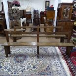 A pair of Antique pegged oak hall benches, L214cm, H80cm