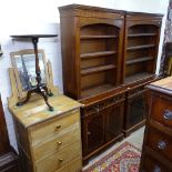 A reproduction mahogany 2-section library bookcase, with open shelves and base fitted with drawers
