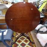 A Georgian mahogany tilt-top table on tripod base