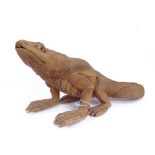 A carved wood lizard, length 45cm