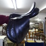 A Meadow Creek leather saddle