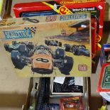 A Scalextric 31 set, 3 Hornby electric train sets - Freightmaster, Intercity Mail and Rural Rambler,
