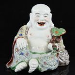 A Chinese porcelain seated Buddha, height 16cm Perfect condition