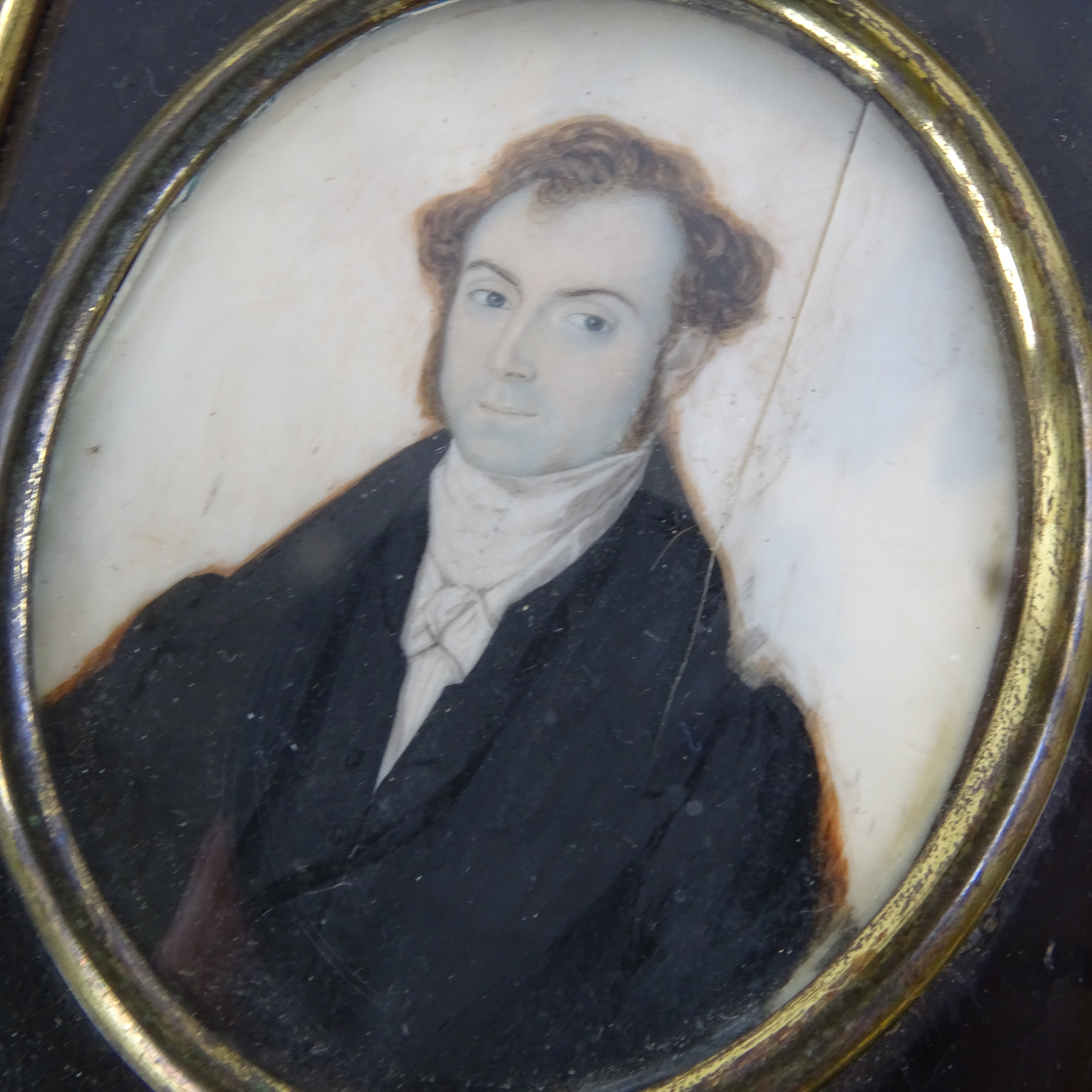 A Georgian miniature watercolour on ivory, half-length portrait of a gentleman wearing a black - Image 2 of 3