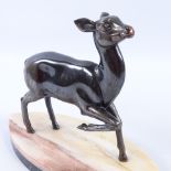 A French bronze patinated spelter sculpture of a fawn, circa 1950s, unsigned, on a 2-colour marble