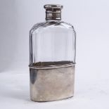 A Victorian silver mounted hip flask, hallmarked Birmingham 1881 maker J.L., height 14cm. Good