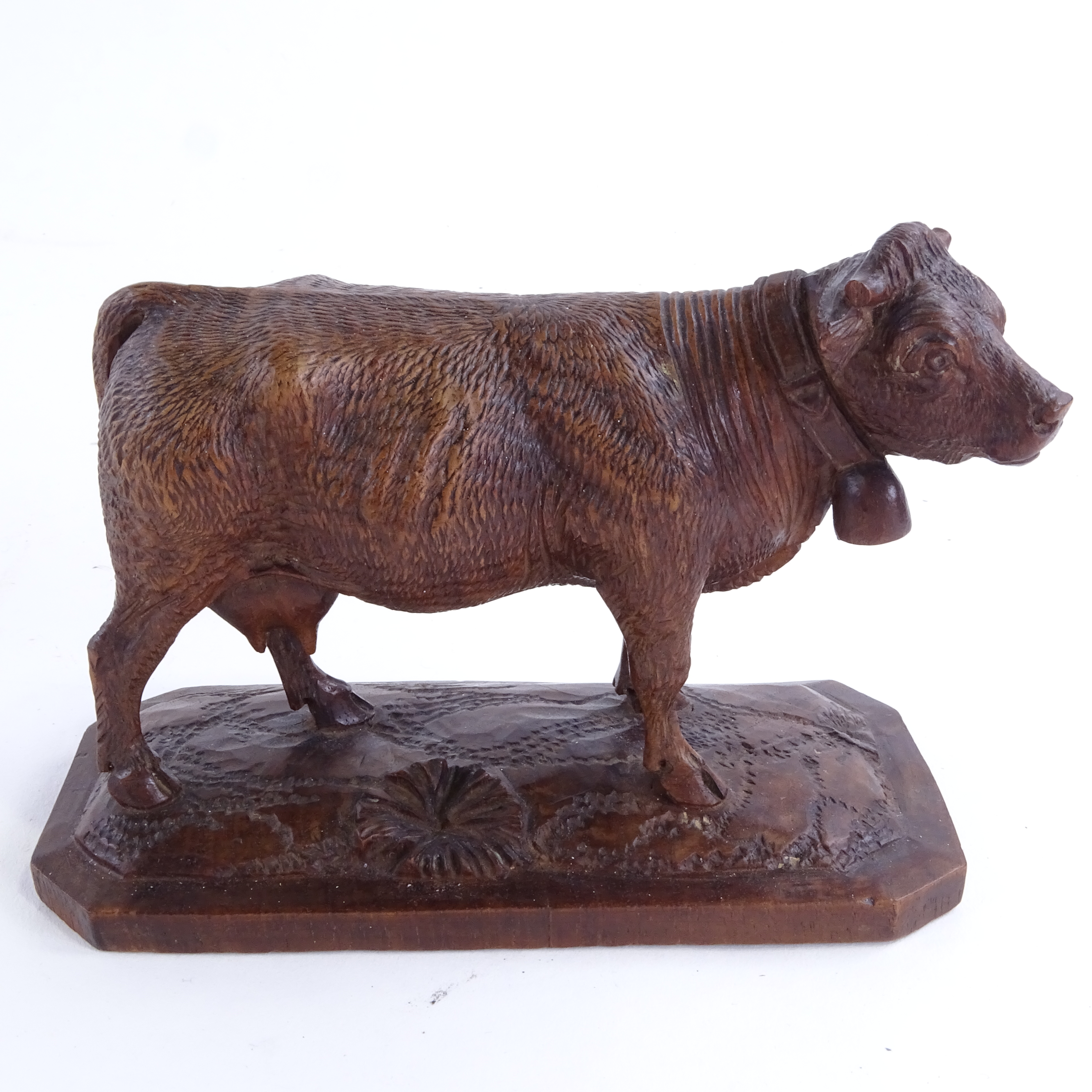 Attributed to Johann Huggler, a finely carved Linden wood Black Forest bell cow, base length 13cm - Image 2 of 3