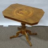 An Italian walnut Sorrento tea table with marquetry horse and rider decoration, 81cm x 53cm