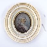 A Georgian miniature watercolour on ivory, portrait of a lady with powdered hair, unsigned in