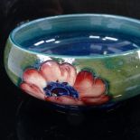 MOORCROFT POTTERY - Anemone pattern bowl, overall diameter 14cm Interior of bowl glazing is