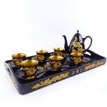 A Chinese gilt black lacquer tea set, with relief dragon decoration, tray 47cm x 27cm. Good