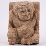 An Antique South American relief carved terracotta or stone plaque depicting a kneeling figure,
