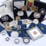 A group of commemorative coins, including Britannia 2017 UK 6 coin silver proof set, 2017 Platinum