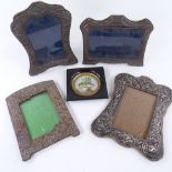A group of photo frames, comprising an Edwardian embossed silk-fronted frame, Birmingham 1907,