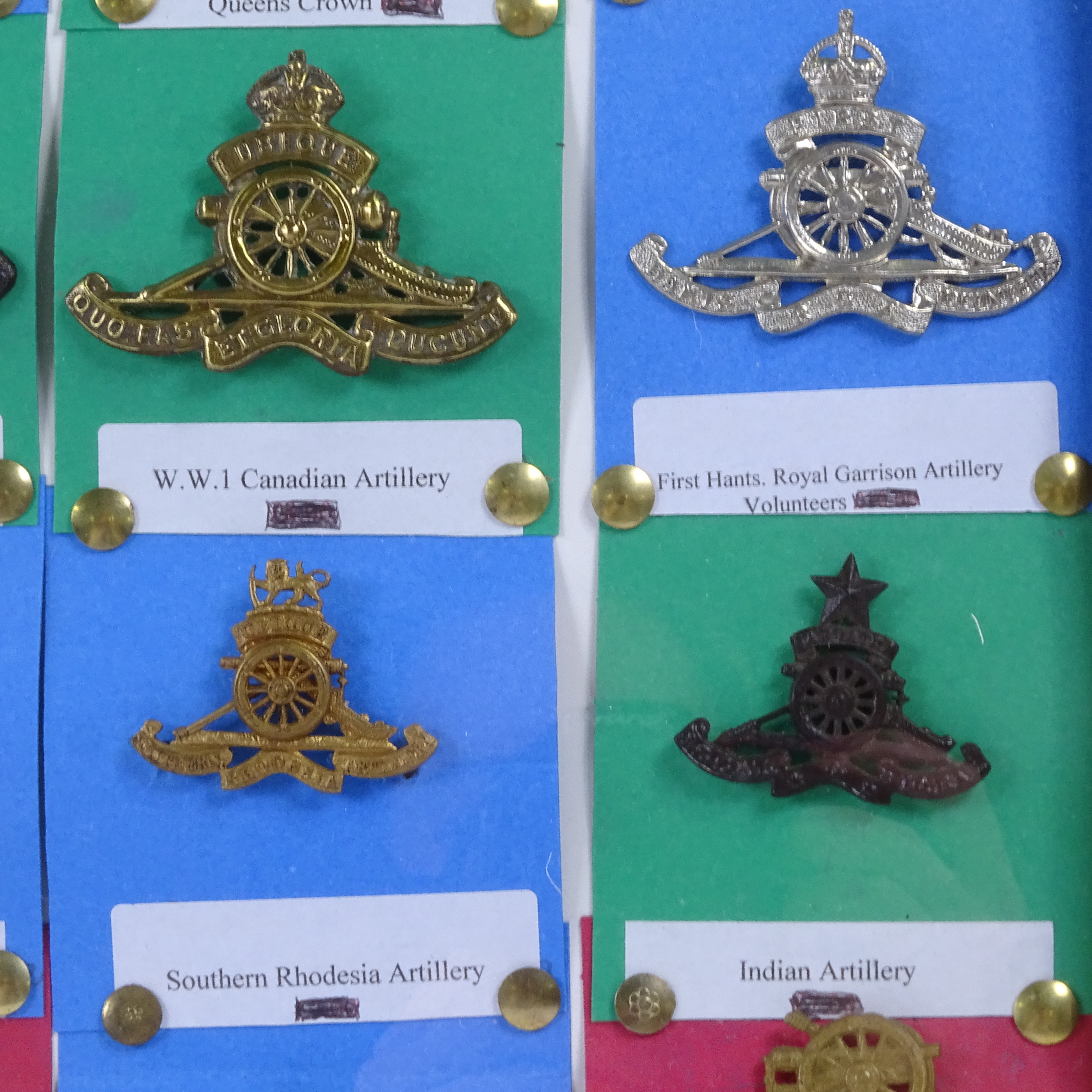 A collection of 21 Royal Artillery cap badges. In good used condition, badges are in box frame - Image 3 of 3