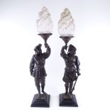 A pair of Victorian spelter figural lamps, with original frosted glass flaming torch shades, overall
