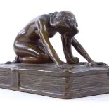 FRANZ BERGMAN - Austrian patinated bronze sculpture, nude figure kneeling on a book, unsigned,