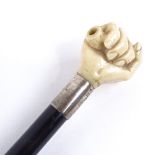 A 19th century ebony walking cane, with marine ivory clenched fist knop and silver collar, by Briggs