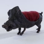 An Austrian patinated bronze wild boar design pin cushion, length 12cm, no marks One leg slightly