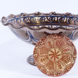 A Hispano-Moresque lustre faience tazza, and another small dish, tazza diameter 27cm. Tazza in