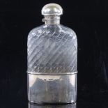 A Goliath silver mounted hip-flask, hallmarked 1889 Drew & Sons, height 21cm a/f. Cracked through