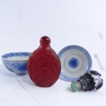 A Chinese porcelain tea bowl and cover, blue and white underglaze chrysanthemum decoration, diameter