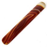 A polished red banded agate page turner, length 21cm Good condition.