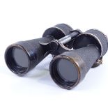 A pair of German Second World War Period military binoculars, 7x50, with military crest Worn used