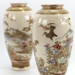 A pair of Japanese Satsuma porcelain vases, with painted and gilded birds and trees, signed under