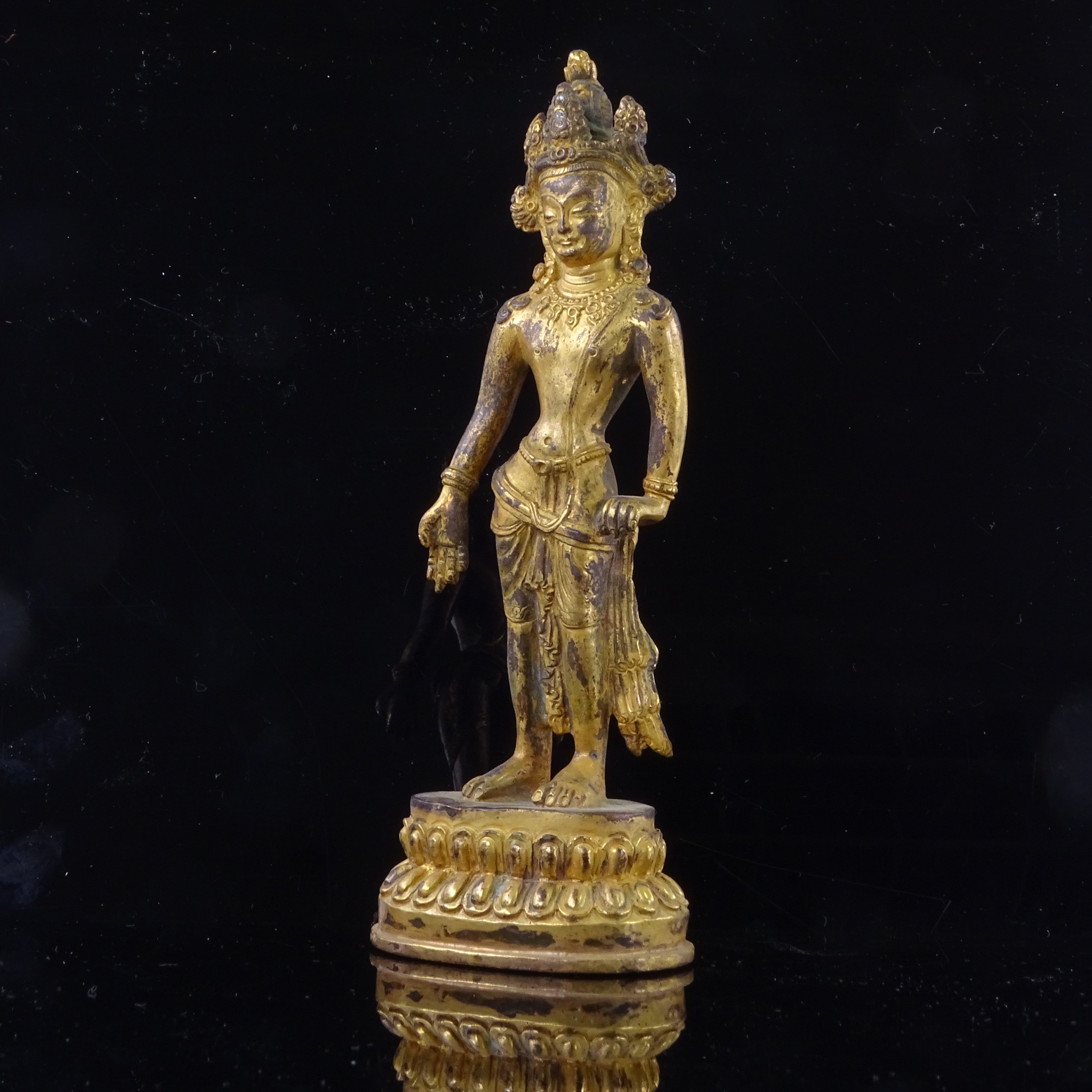 An Oriental gilt-bronze figure of Guanyin standing on a lotus flower plinth, height 16cm Gilding - Image 2 of 3