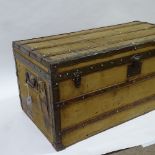 MOYNAT PARIS - Vintage metal and wood-bound canvas-covered travelling trunk, original paper label