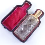19th century cut-glass perfume bottle with gold hinged top, height 8.5cm, in original leather case