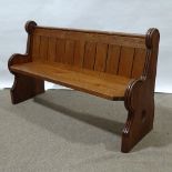 A Victorian pitch pine Gothic church pew of small size, length 140cm