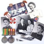 A collection of Red Cross Society medals photos and badges