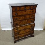 A Georgian figured walnut chest on chest, with 3 frieze drawers and 6 long drawers below, on bracket