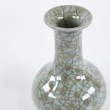 A Chinese celadon crackle glaze porcelain vase, seal mark under base, height 18cm 2 tiny chips on