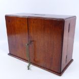 A 19th century mahogany apothecary box, with brass carrying handle and 2 hinged doors, lacking